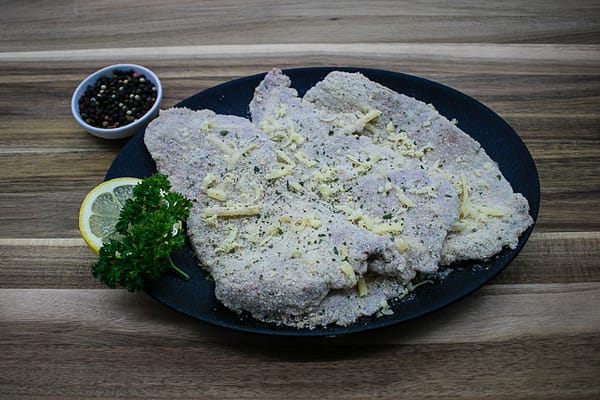 Ron and Dans Crumbed Steak with cheese, Parsley and Garlic Crumb